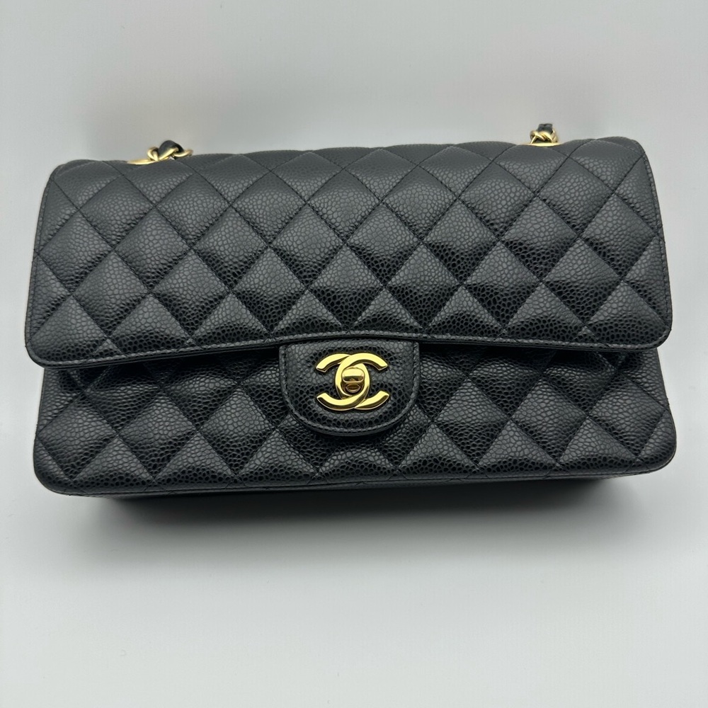 Authentic Chanel flap bag with original box and dust bag.